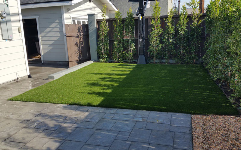Residential Garden Landscaped With Artificial Grass